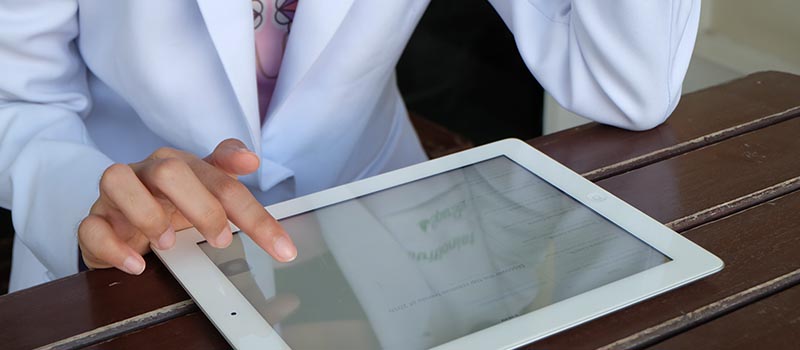 doctor using a tablet