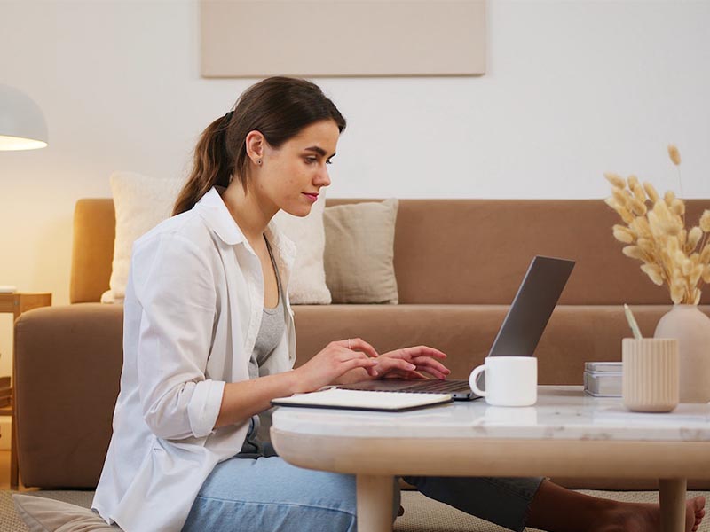 woman working on her laptop