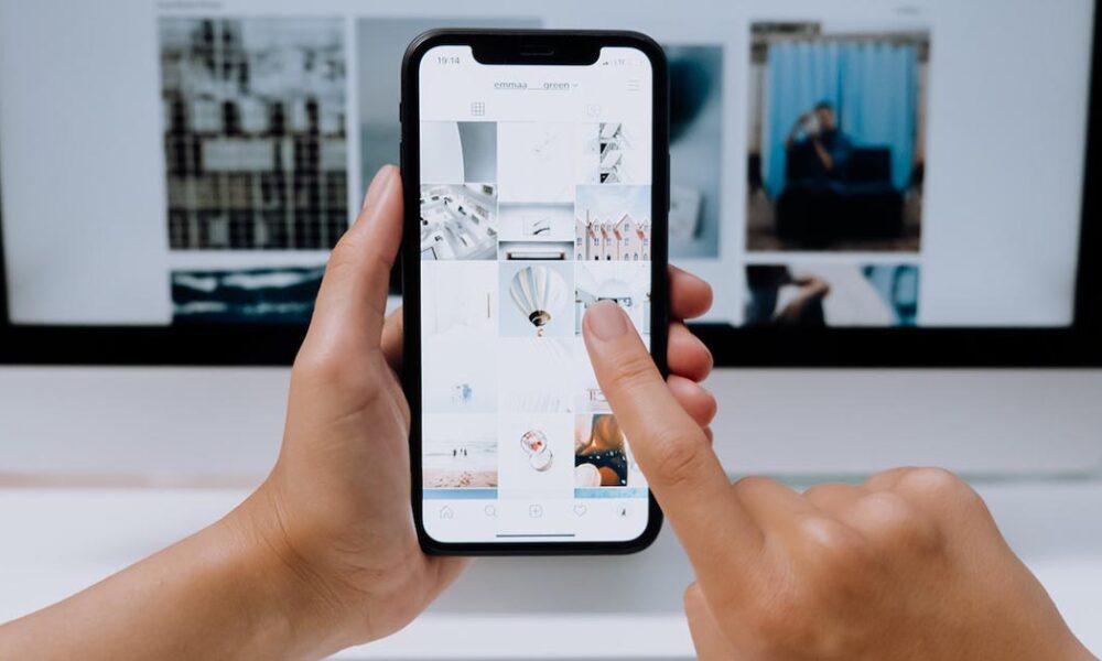 Canva app on laptop and mobile
